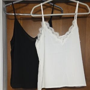 (2) Black And White Flowy Tanks